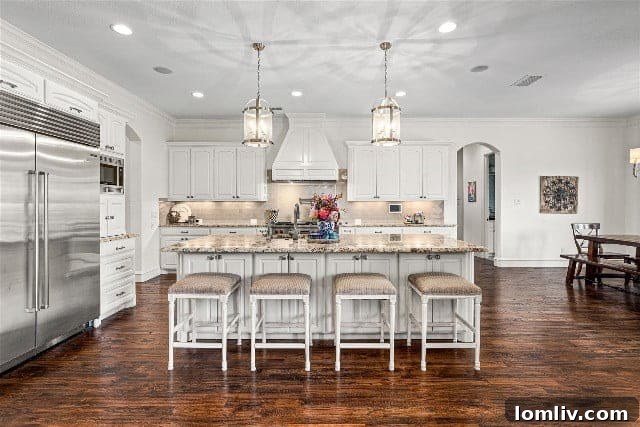 Spacious living room with high ceilings and fireplace