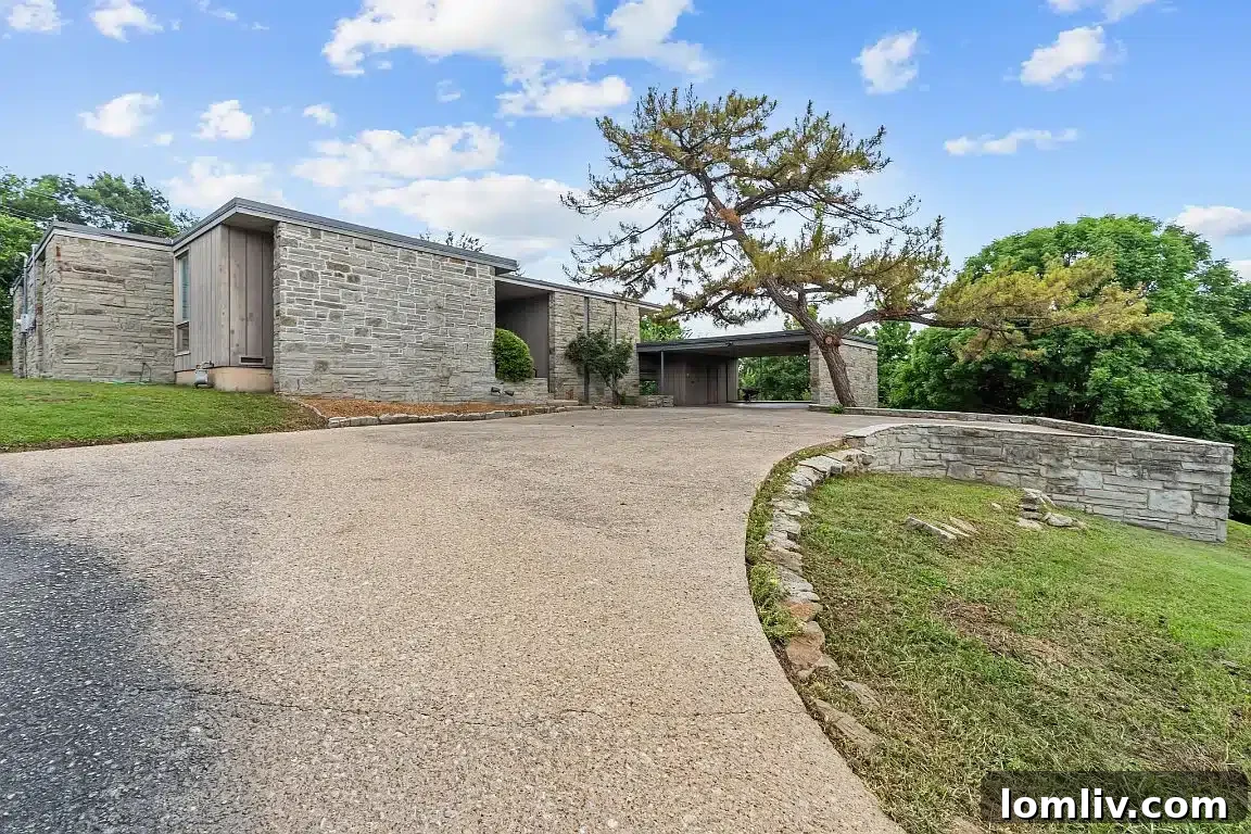 A stunning Fort Worth Midcentury Modern home exterior, showcasing clean lines and natural materials.
