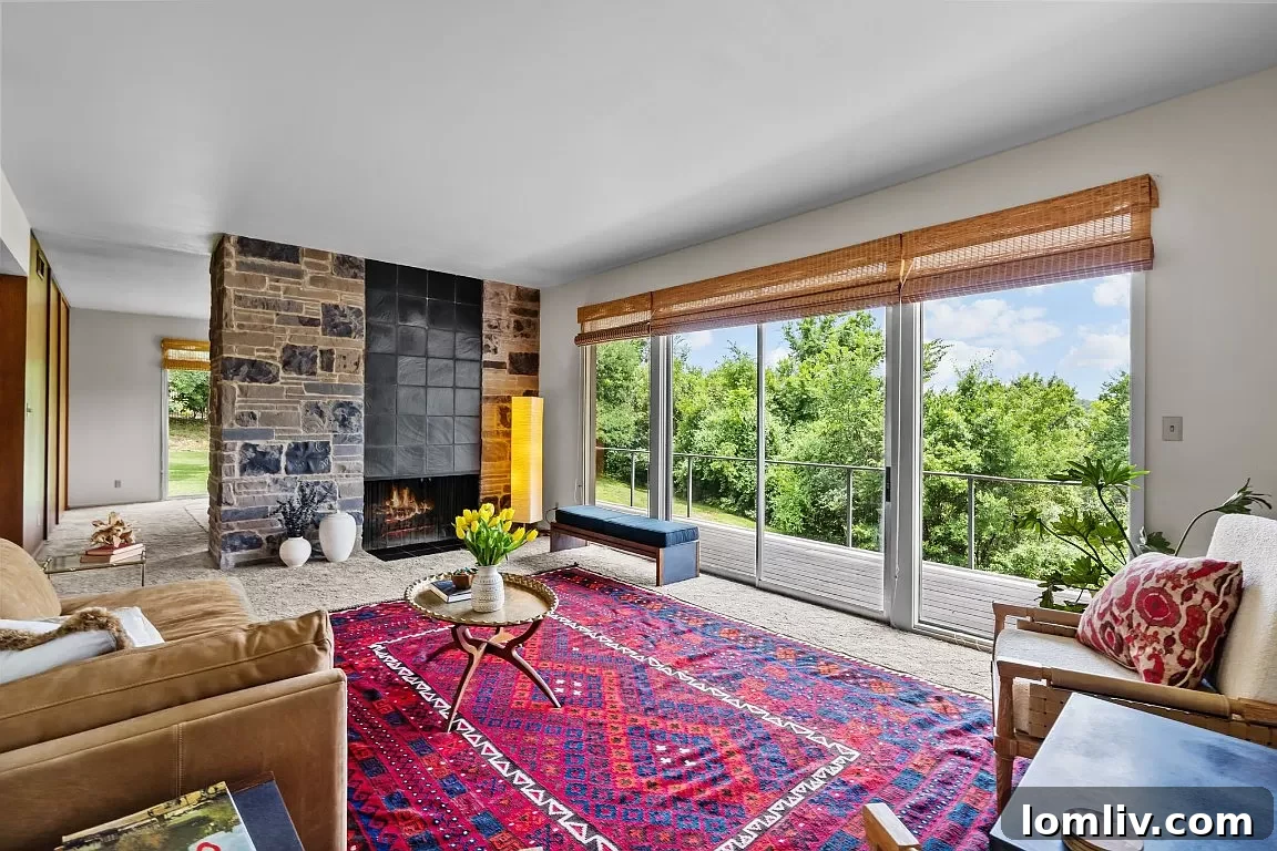Expansive floor-to-ceiling windows flood the living area with natural light.