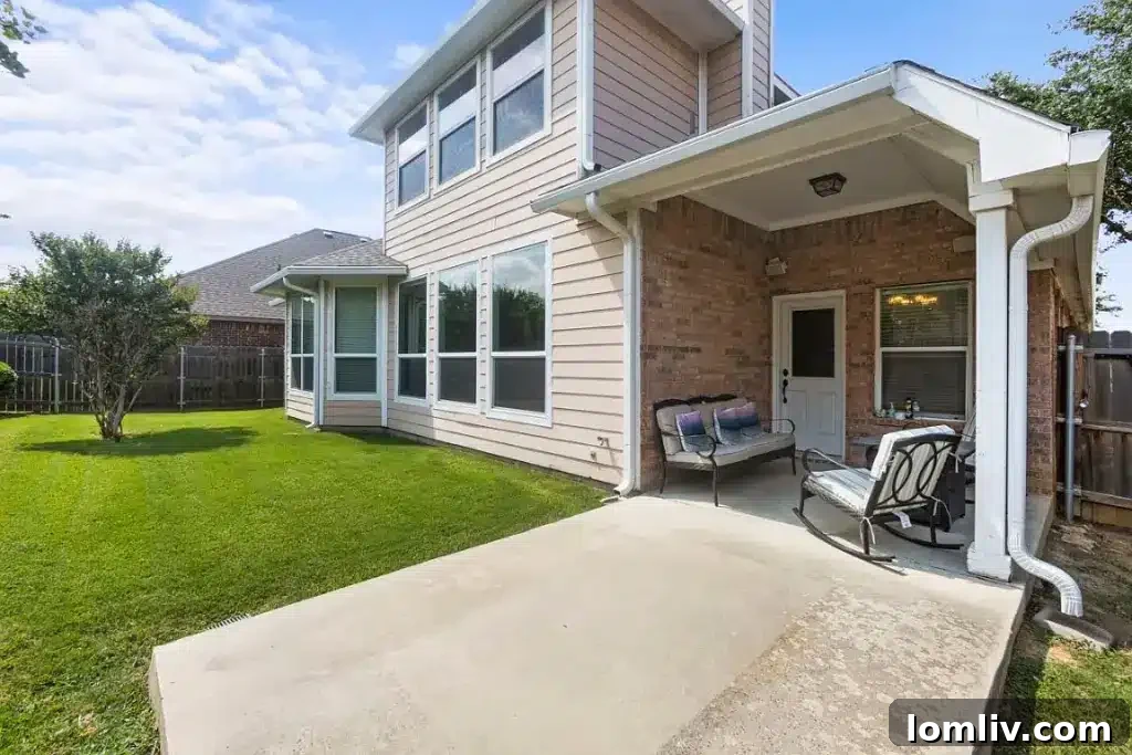 Exterior shot showcasing the home's attractive curb appeal and landscaping