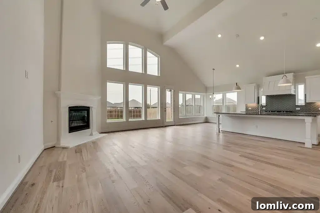 Spacious and bright living area with high ceilings and large windows