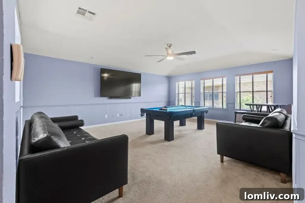 Lush green backyard with a well-maintained lawn, ideal for outdoor activities