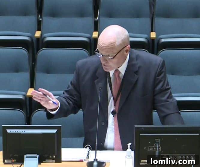 Inspector General Bart Bevers speaking at a conference.