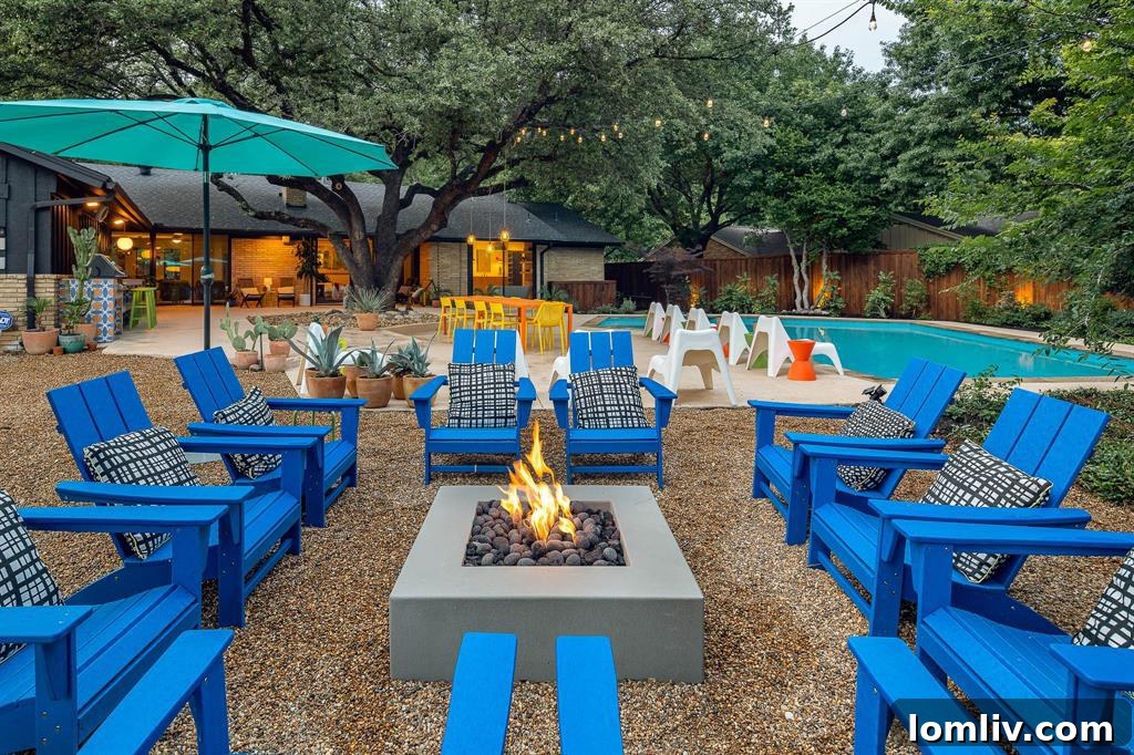 A cozy outdoor seating area with a concrete firepit, perfect for evening gatherings.