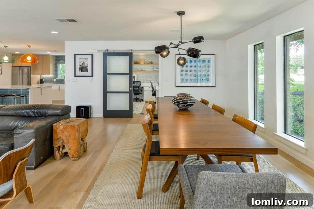 Another perspective of the renovated living space, highlighting clean lines and artistic touches.