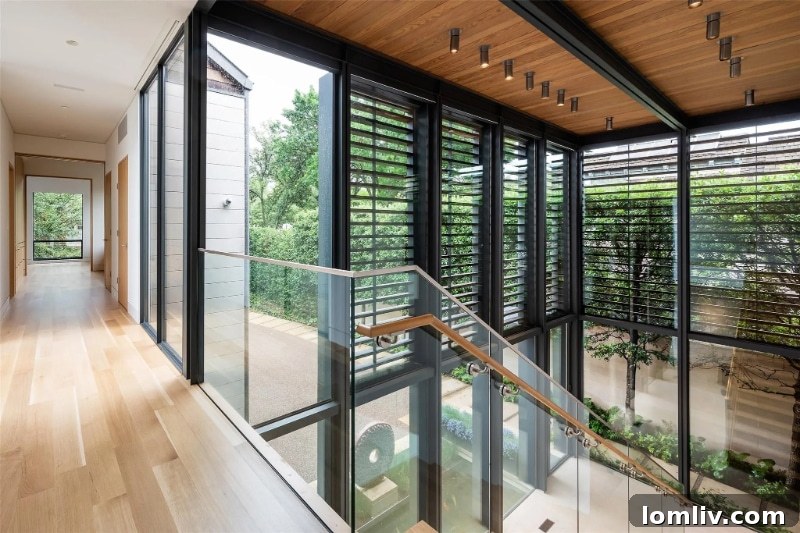 Exterior of 6625 Golf Drive with a cantilevered deck overlooking Turtle Creek