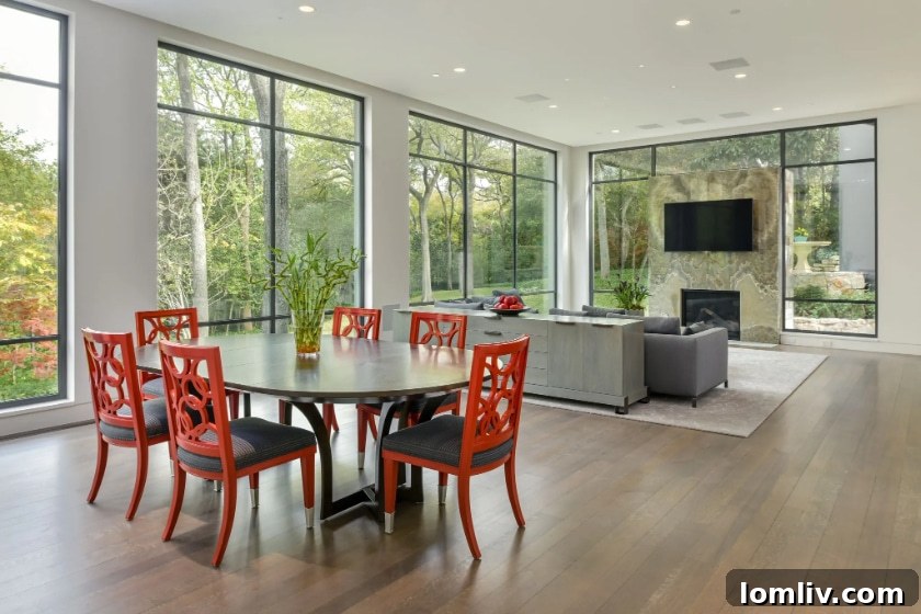 Modernist living space with minimalist decor and views of nature