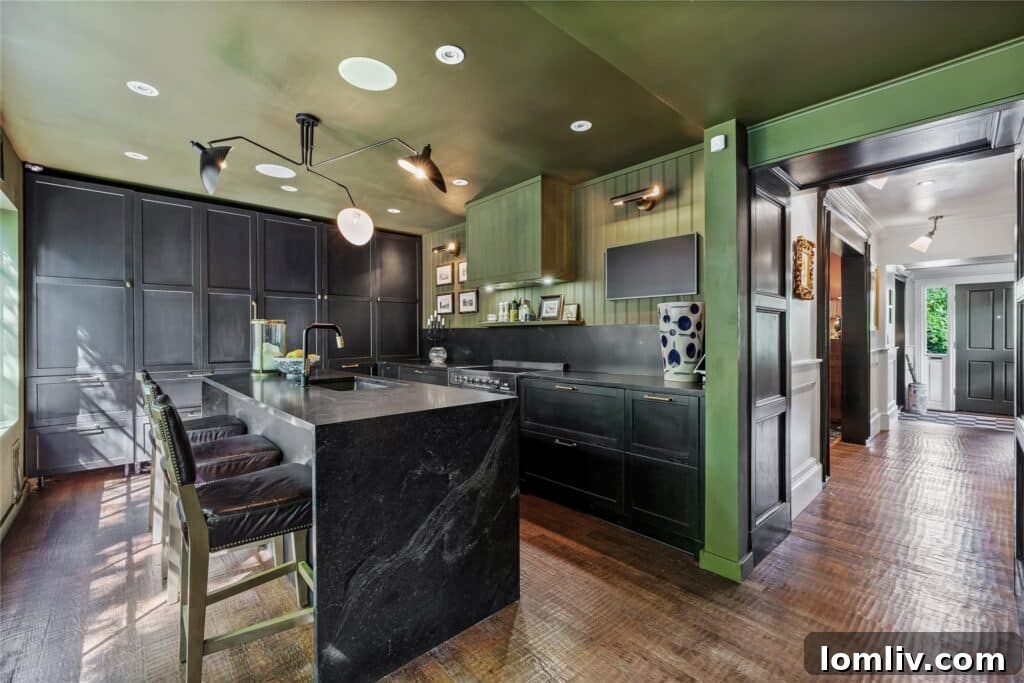 Beckley Club Estates' Reimagined Cottage: The Standard Has Been Raised 11 Stylish kitchen with black and olive green cabinets, showcasing the blend of bold colors and modern design