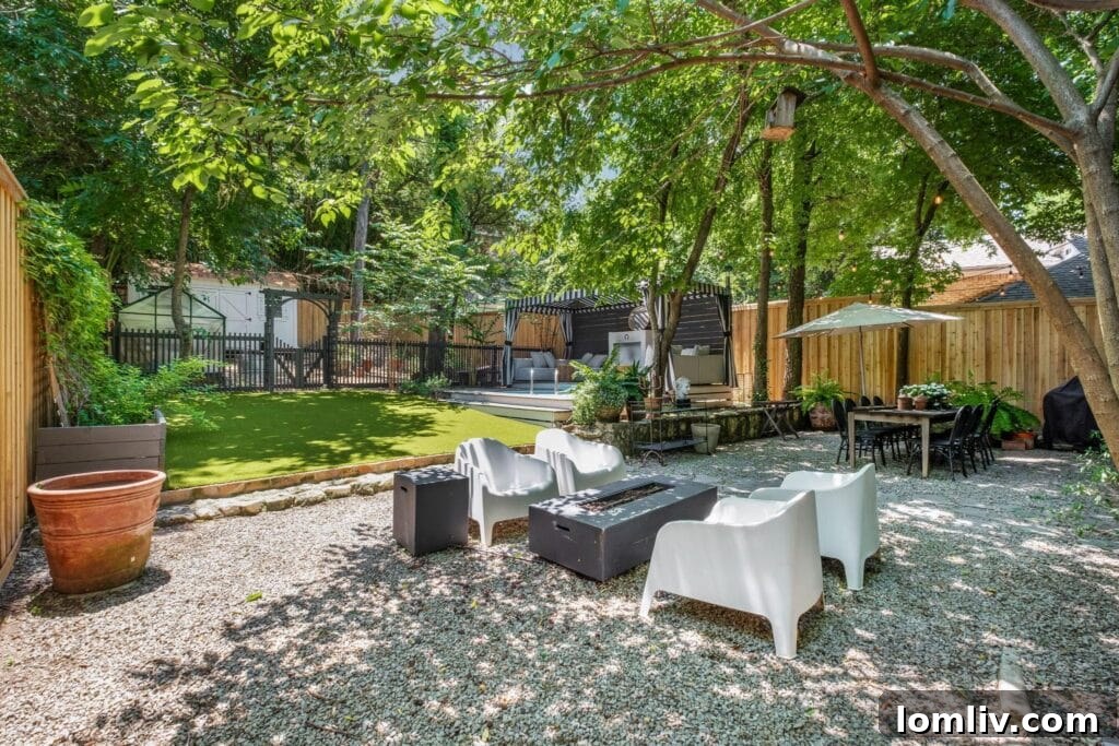 Beckley Club Estates' Reimagined Cottage: The Standard Has Been Raised 12 Inviting backyard oasis with shaded dining area, artificial grass, and a stylish cabana