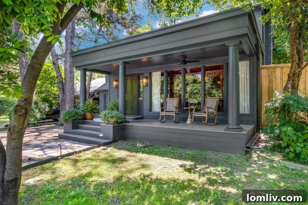 Beckley Club Estates' Reimagined Cottage: The Standard Has Been Raised 3 Elegant interior view showcasing black and white tile entry and a glimpse into the designer living space