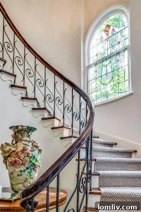 Elegant living room interior with fireplace in a Dallas Tudor home