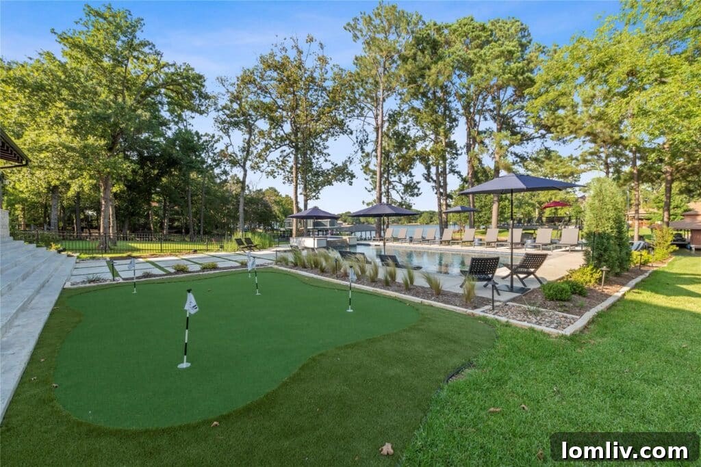 Expansive covered patio with an outdoor kitchen, living, and dining areas.