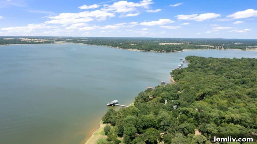 Panoramic view of Cedar Creek Lake from a luxury home, showing vast open water and clear skies.
