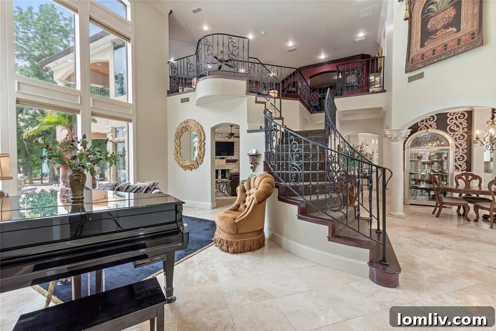 Spacious kitchen with granite countertops, stainless steel appliances, and a large island.