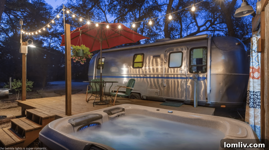 A serene view of Jacob's Well in Wimberley, Texas, with crystal-clear water and lush green surroundings.
