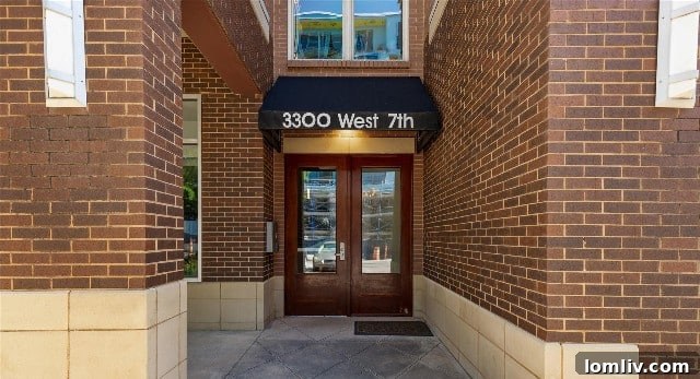 Street view entrance of 3300 West 7th Condos, highlighting easy access from the bustling West 7th corridor or a private garage.