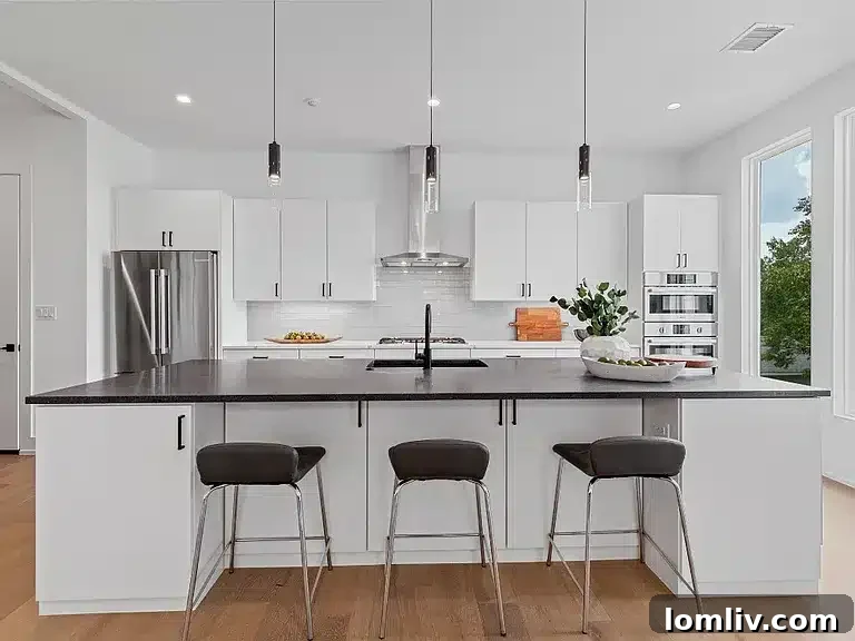 Elegant primary bedroom with ample natural light in the Dallas live-work home.