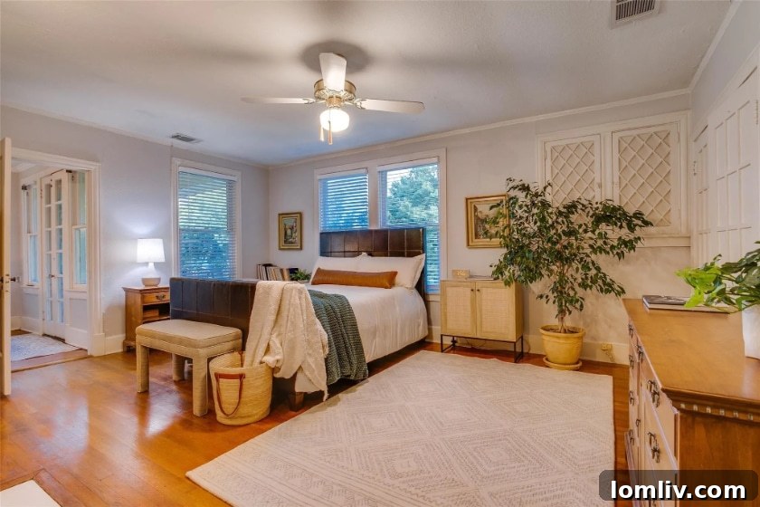 Winnetka Heights Landmark Marks 100 Years of Inspiring Innovation 10 Master bedroom with sitting area in Winnetka Heights