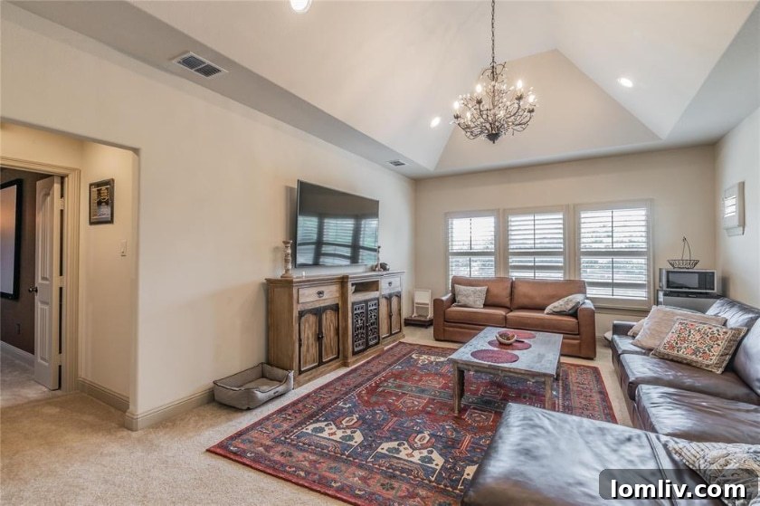 Another view of the spacious backyard, highlighting its potential for a swimming pool or other recreational facilities.