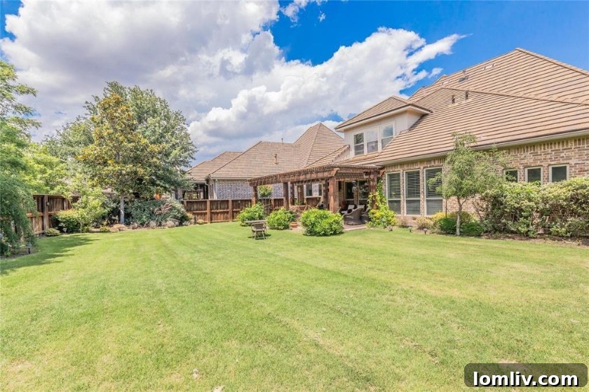 The stunning architecture of the Toyota Music Factory lit up at night, with a lively atmosphere.