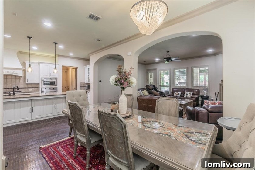 A pristine, modern home exterior in Las Colinas with a two-car garage and manicured landscaping.