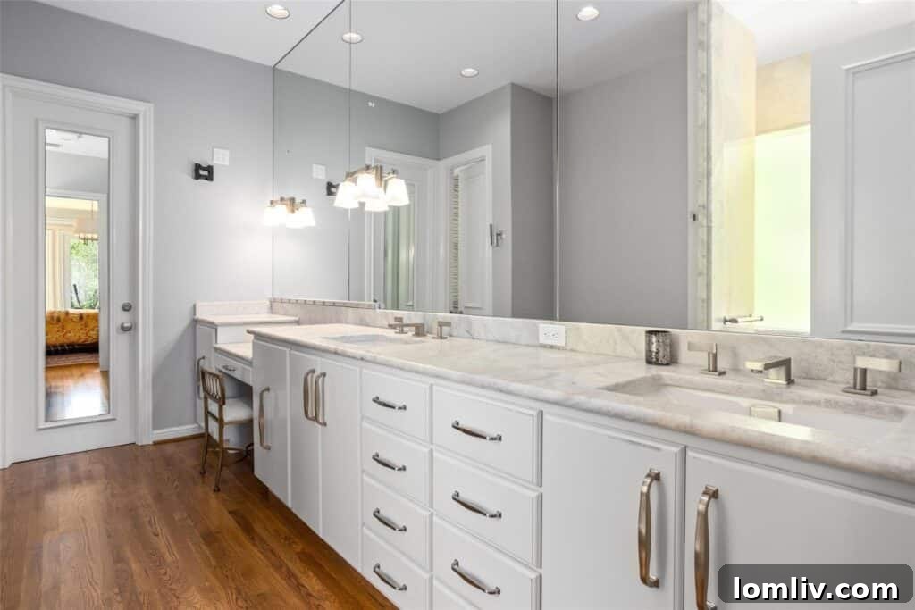 Spacious primary bedroom with multiple windows