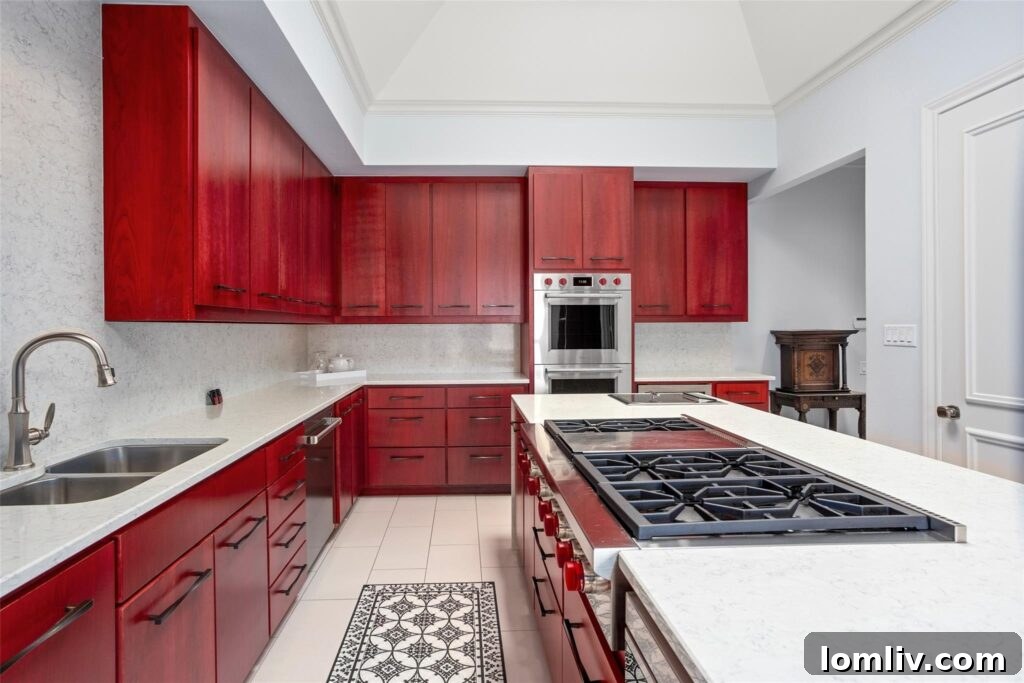Modern kitchen with waterfall island and high-end appliances