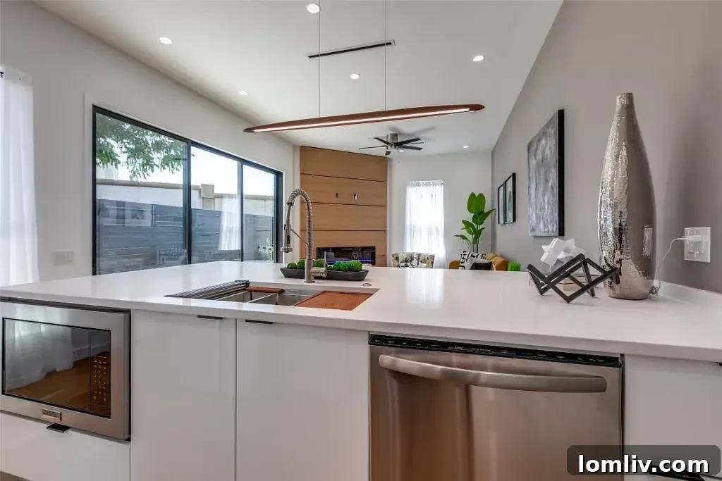 Modern kitchen design with custom cabinets and stainless steel appliances in Dallas new construction