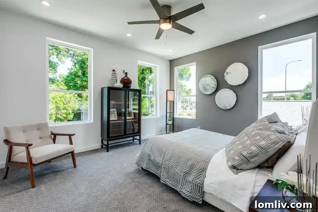 Luxurious primary bedroom with ensuite bathroom and walk-in closet in a Maple Heights home