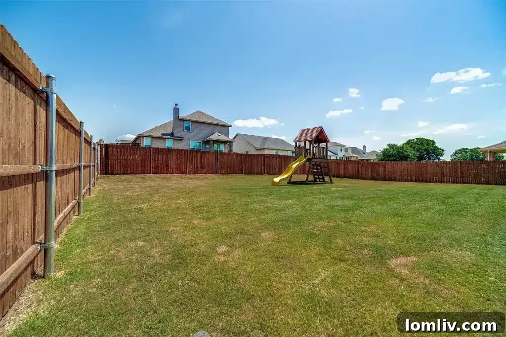 Go West to Springtown: Live the Country Dream on a Budget 15 An inviting covered patio in a large backyard, furnished with outdoor seating, overlooking a spacious lawn and mature trees in the distance.