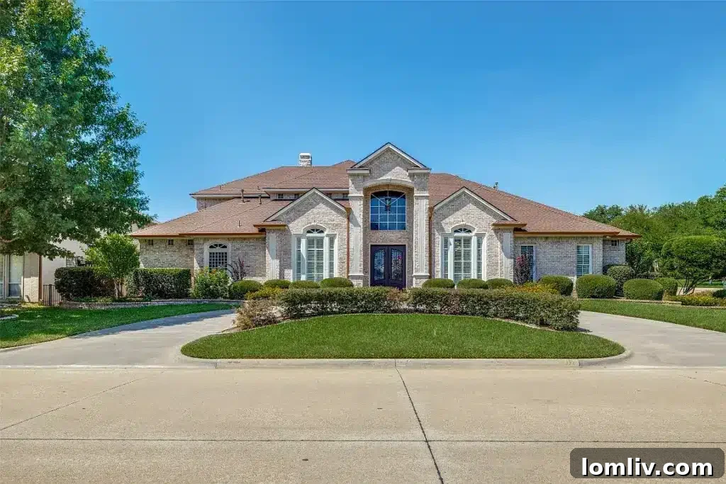 Grand exterior of 1305 Danbury Drive, a well-maintained executive home in Mansfield, TX