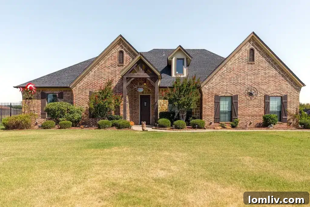 Elegant exterior of 7301 Granville Drive, a custom-built home on an acre lot in Mansfield, TX