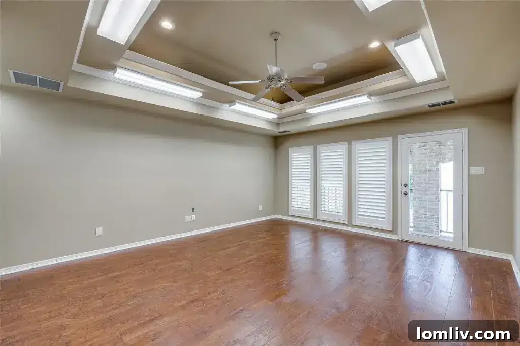Spa-inspired master bathroom with large tub and separate shower at 1305 Danbury Drive
