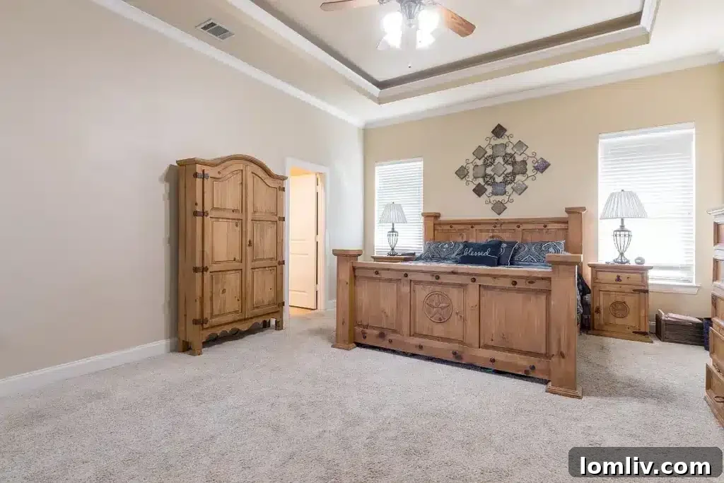 Luxurious master bedroom with serene ambiance at 7301 Granville Drive