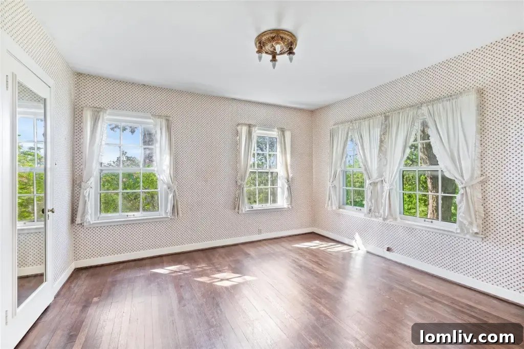 A bright and airy kitchen space, showcasing potential for modern updates while preserving its classic layout.