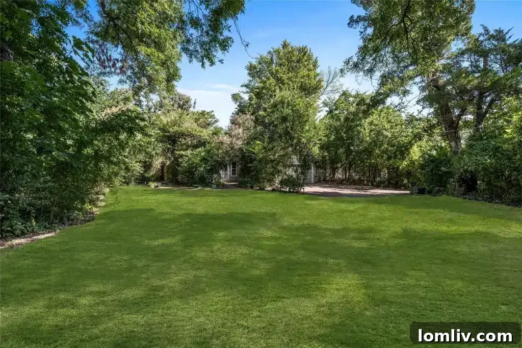 A view of the elegant staircase within the home, hinting at the traditional craftsmanship and potential for restoration.