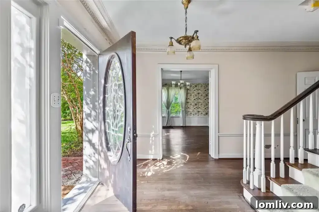 Another perspective of the home's exterior, showcasing the expansive grounds and the proximity to the golf course.