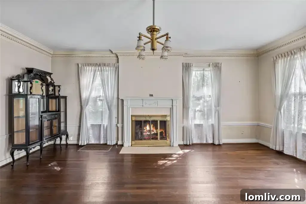 A room within the Plymouth Road home, featuring period-appropriate decor and a fireplace, suggesting the comfort of previous inhabitants.