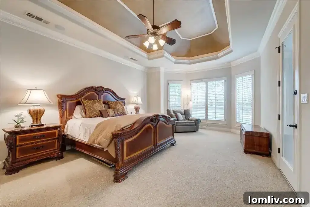 Keller's Beautiful Homes: The Epitome of Suburban Perfection 11 Exterior view of the backyard pool area with elegant water features