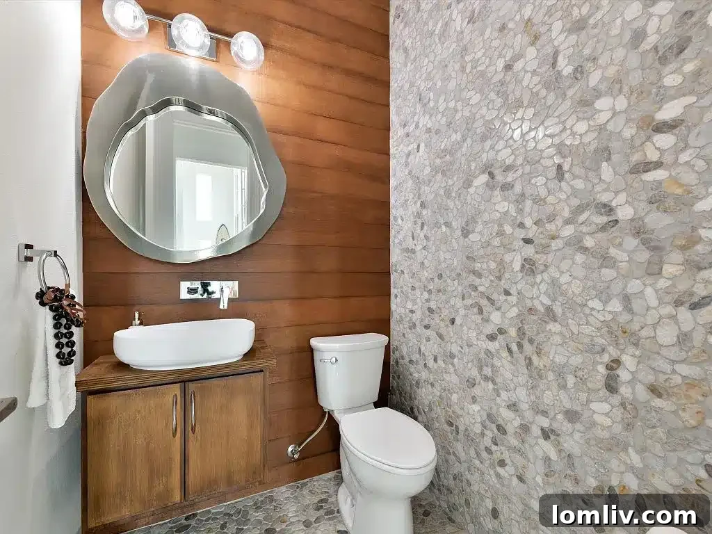 Keller's Beautiful Homes: The Epitome of Suburban Perfection 16 Elegant dining space with direct access to outdoor views through glass doors