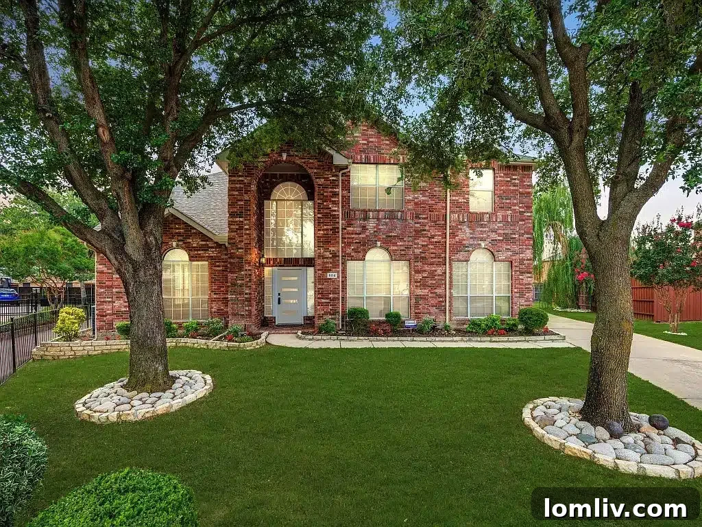 Keller's Beautiful Homes: The Epitome of Suburban Perfection 22 Exterior of a welcoming family home at 504 Evelyn Court with a three-car garage