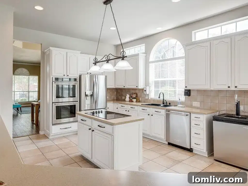 Keller's Beautiful Homes: The Epitome of Suburban Perfection 26 Flexible room adjacent to the basketball court, ideal as a game room