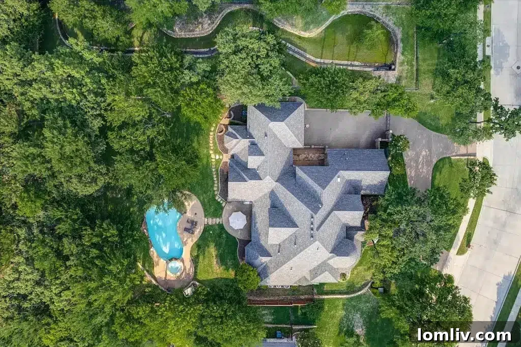 Keller's Beautiful Homes: The Epitome of Suburban Perfection 4 Sophisticated living room with high ceilings and natural light at 1305 Danbury Parks Drive