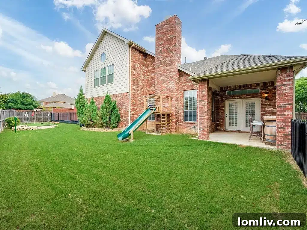 Keller's Beautiful Homes: The Epitome of Suburban Perfection 30 Covered patio area, ideal for relaxing outdoors