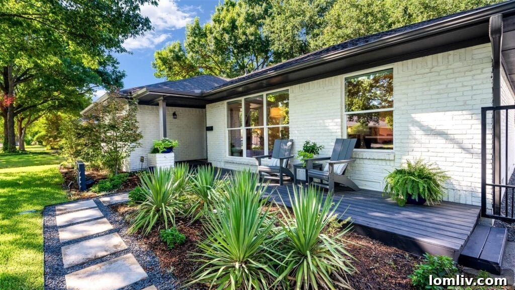 Your Cozy Lakeside Haven Awaits 2 Exquisite East Dallas single-story home with a pristine exterior and lush landscaping