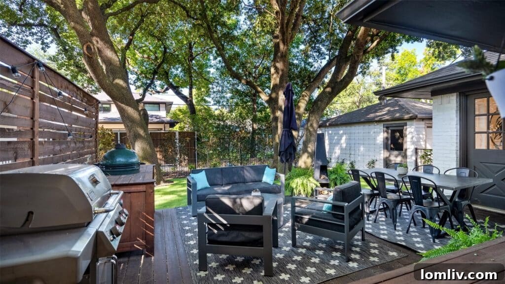 Your Cozy Lakeside Haven Awaits 3 Expansive 20-foot backyard deck with built-in Green Egg grill in a lush East Dallas garden