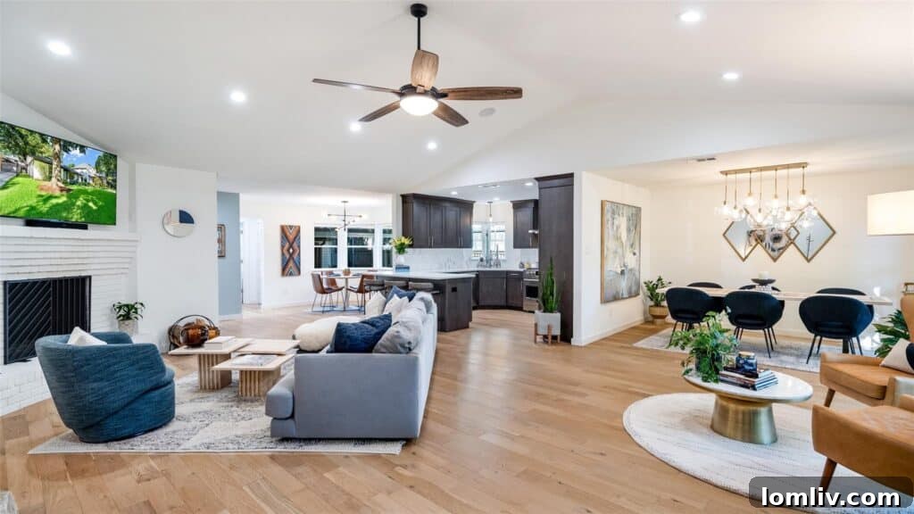 Your Cozy Lakeside Haven Awaits 5 View of the meticulously maintained backyard with vibrant green grass and decorative plants