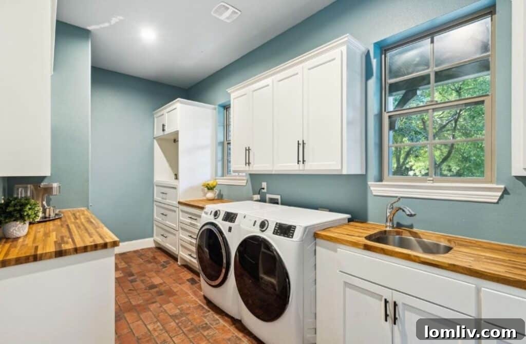 Spacious and stylish laundry room at 18 Shadywood Lane