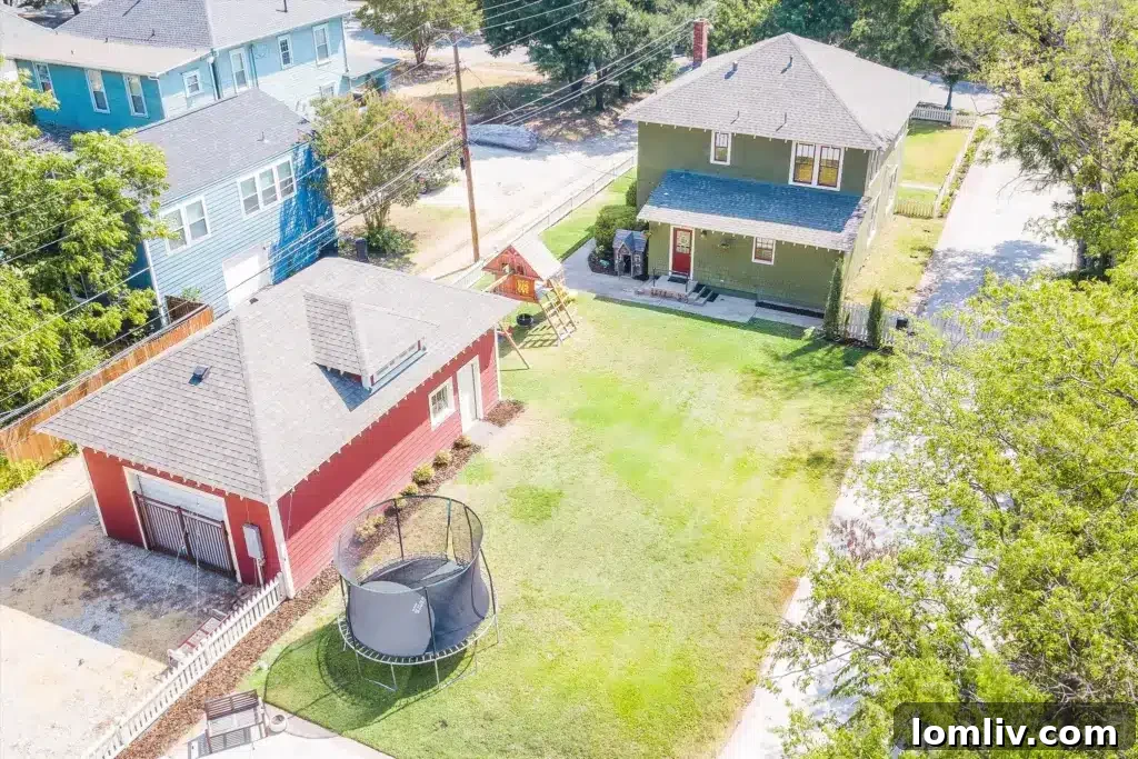 Fort Worth Craftsman A Colorful Renovation Fueled by Love 9 Luxurious bathroom with clawfoot tub and antique style fixtures in renovated home
