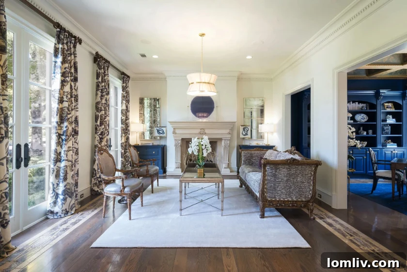 A detailed view of the elegant entrance and meticulously maintained grounds of the Highland Park manor.